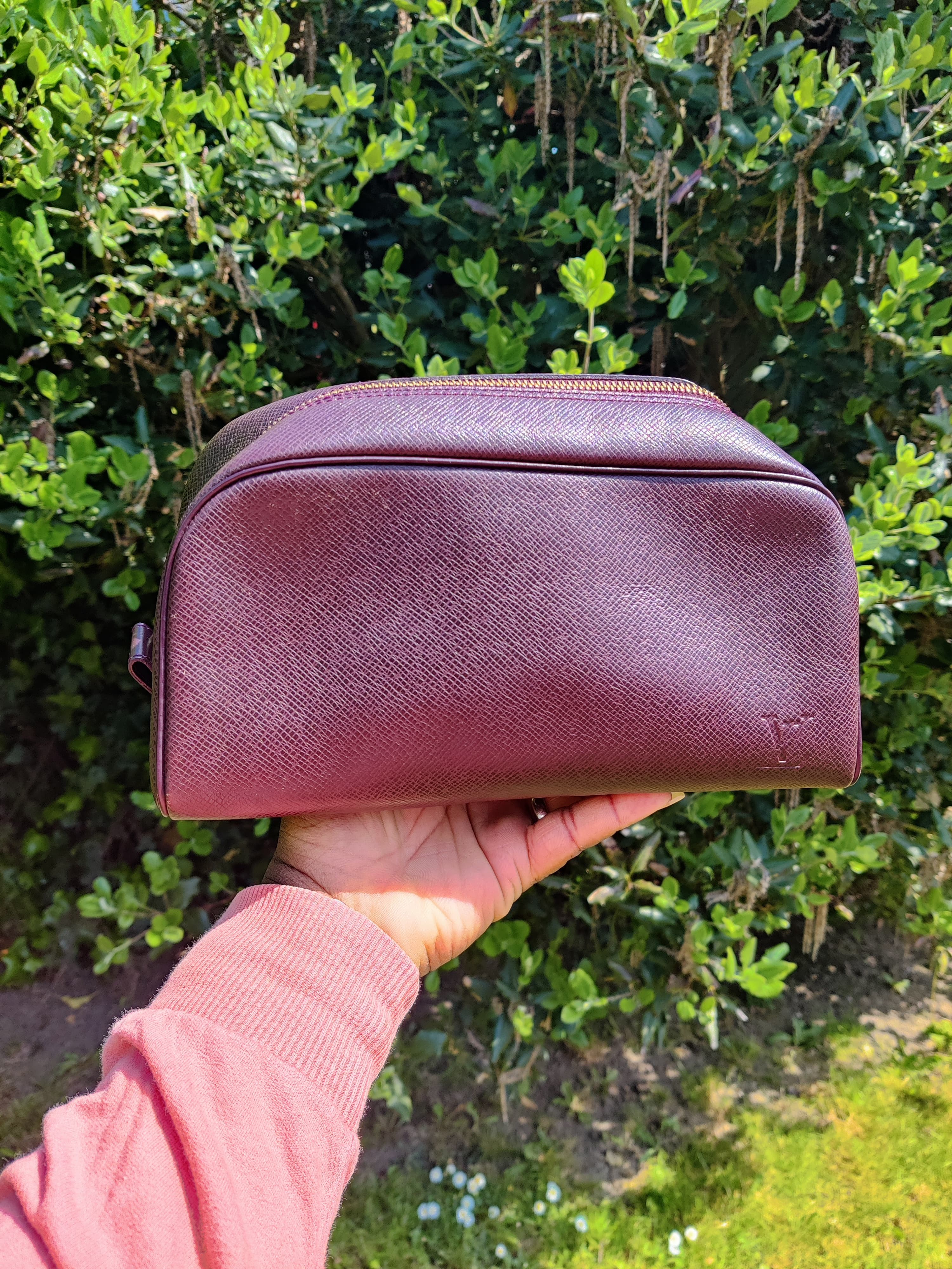 Louis Vuitton True Toilette PM Taiga Bordeaux - Image 1